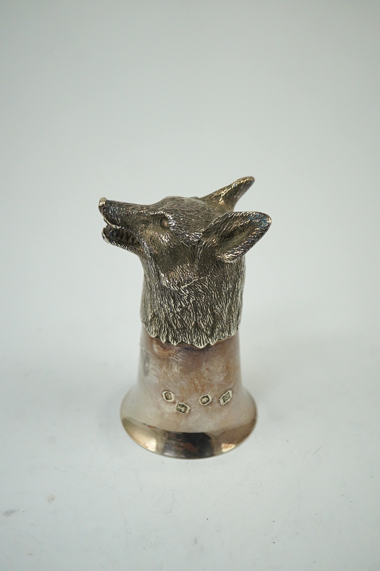 An Elizabeth II fox head stirrup cup, by Royal Irish Silver Company